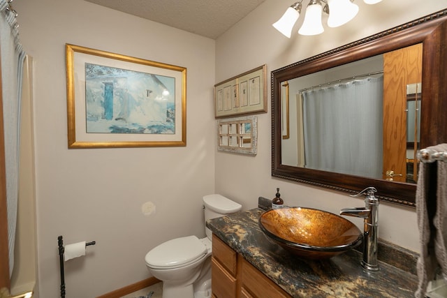 4887 Tee Ct SW, Rochester, MN 55902 - bathroom featuring vanity, a textured ceiling, and a shower with shower curtain