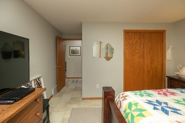 4887 Tee Ct SW, Rochester, MN 55902 - bedroom with a closet and baseboards