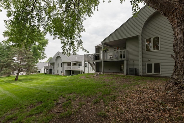 4887 Tee Ct SW, Rochester, MN 55902 - rear view of house featuring a lawn