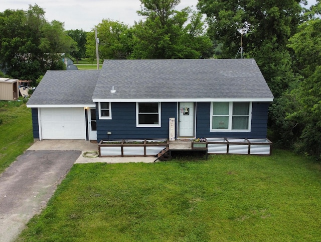 15729 232nd Ave NE, Hawick, MN 56273 - ranch-style house with asphalt driveway, a front lawn, and a shingled roof