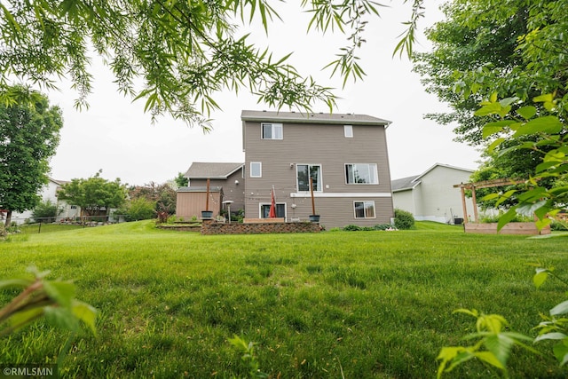 6354 151st Street Ct N, Hugo, MN 55038 - rear view of property with a lawn