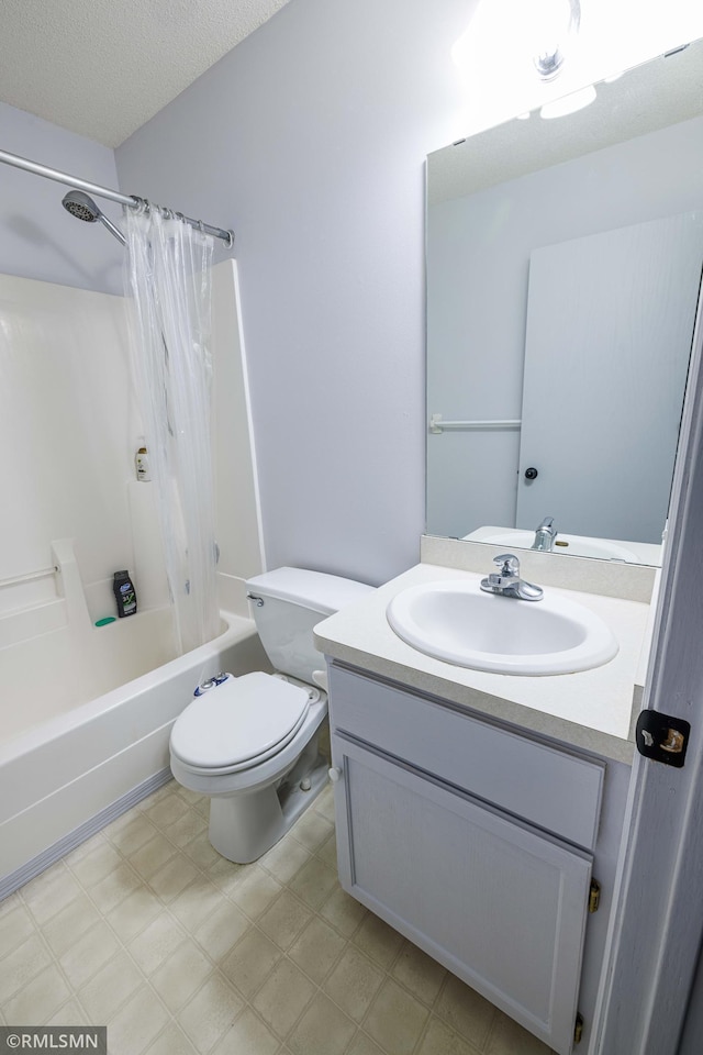 6354 151st Street Ct N, Hugo, MN 55038 - bathroom with vanity, shower / bath combo, tile patterned floors, and a textured ceiling