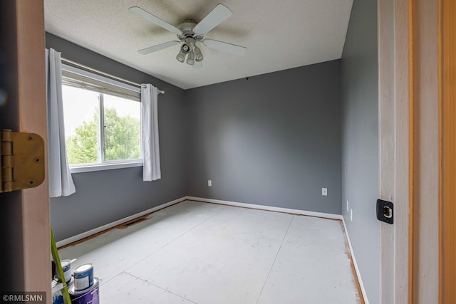 6354 151st Street Ct N, Hugo, MN 55038 - unfurnished room with a ceiling fan and a textured ceiling