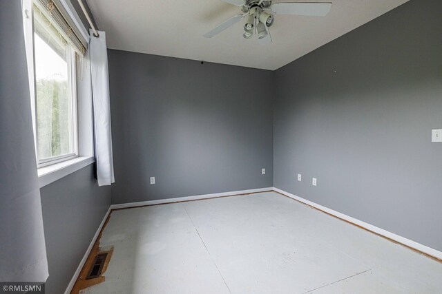6354 151st Street Ct N, Hugo, MN 55038 - empty room with ceiling fan and concrete floors