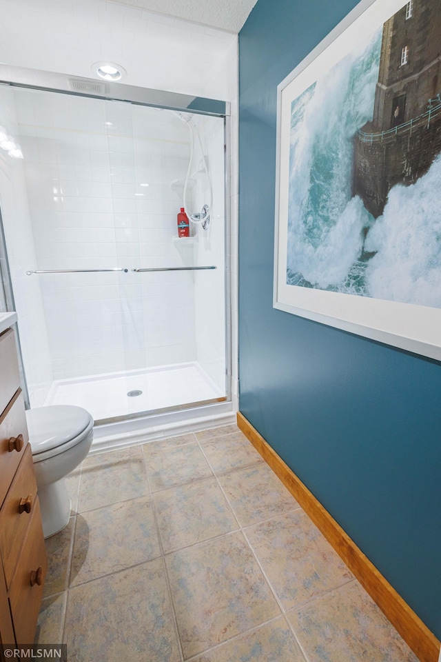 6354 151st Street Ct N, Hugo, MN 55038 - bathroom featuring a shower stall, tile patterned flooring, and vanity