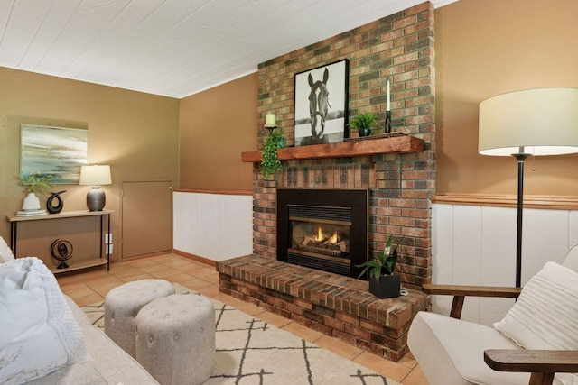 6160 Creek View Rdg, Minnetonka, MN 55345 - living area with tile patterned floors, a wainscoted wall, and a brick fireplace