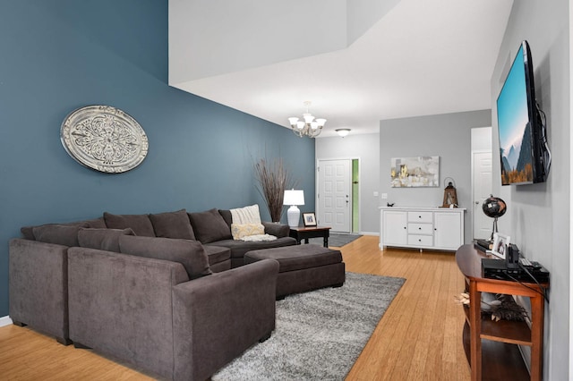 6715 158th St W, Apple Valley, MN 55124 - living room with a chandelier and light wood-style floors