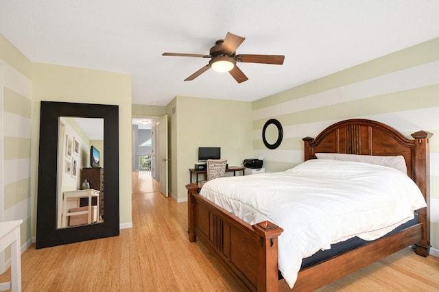 6715 158th St W, Apple Valley, MN 55124 - bedroom featuring light wood finished floors and ceiling fan