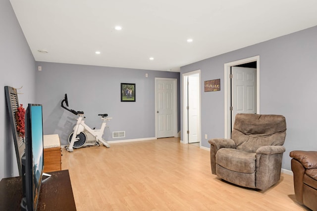 6715 158th St W, Apple Valley, MN 55124 - exercise area featuring light wood finished floors and recessed lighting