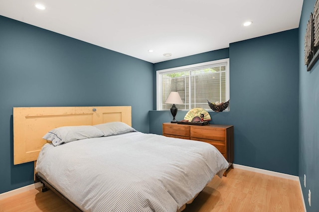 6715 158th St W, Apple Valley, MN 55124 - bedroom with wood finished floors and recessed lighting