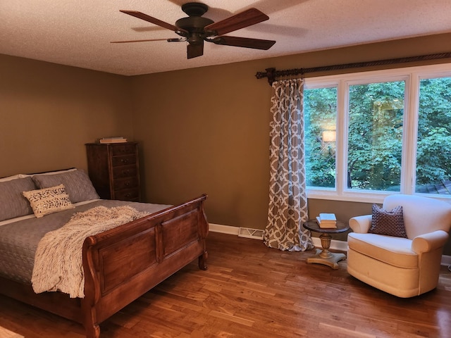 3900 Hillcrest Way, Deephaven, MN 55391 - bedroom featuring wood finished floors and a ceiling fan