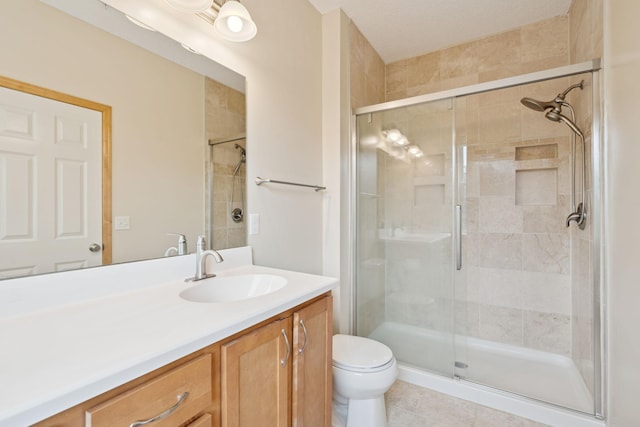 10751 Falling Water Ln Unit C, Woodbury, MN 55129 - bathroom with vanity, a stall shower, and tile patterned floors