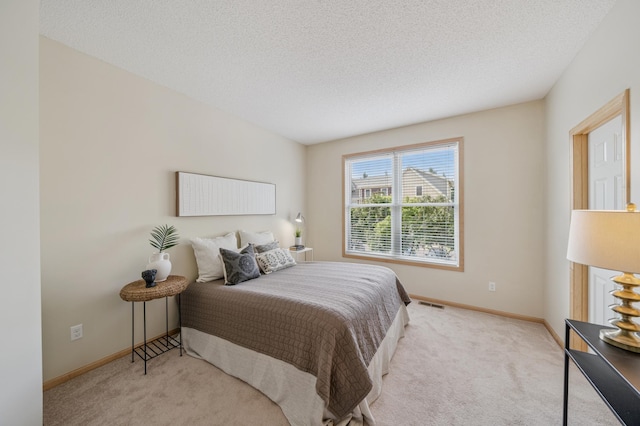 10751 Falling Water Ln Unit C, Woodbury, MN 55129 - bedroom with carpet and a textured ceiling