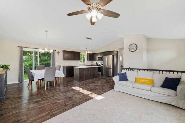 9147 Viking St, Brainerd, MN 56401 - living area featuring vaulted ceiling, a chandelier, dark wood finished floors, and ceiling fan