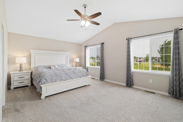 9147 Viking St, Brainerd, MN 56401 - bedroom with vaulted ceiling, carpet, and ceiling fan