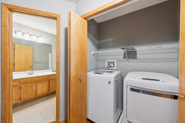 18267 Coneflower Ln, Eden Prairie, MN 55346 - washroom with washing machine and dryer and light tile patterned floors