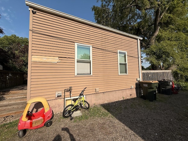 835 9th Ave, Granite Falls, MN 56241 - view of side of property with a wooden deck