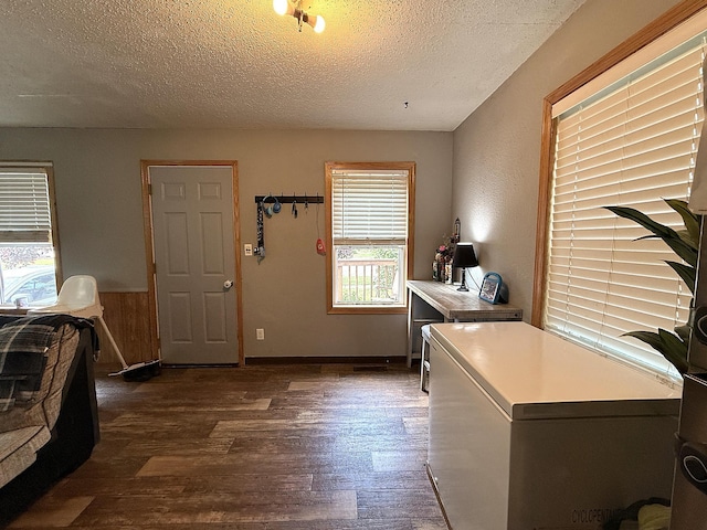 835 9th Ave, Granite Falls, MN 56241 - washroom with a textured ceiling and dark wood finished floors