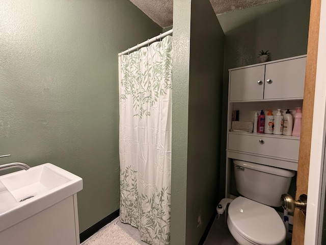 835 9th Ave, Granite Falls, MN 56241 - bathroom with a shower with curtain, vanity, and a textured wall