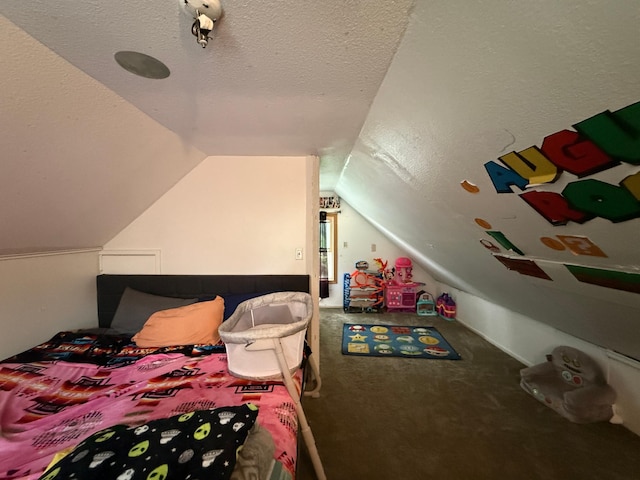 835 9th Ave, Granite Falls, MN 56241 - carpeted bedroom featuring vaulted ceiling and a textured ceiling