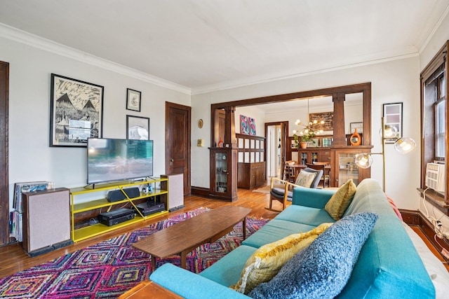 1718 Clinton Ave Unit 6, Minneapolis, MN 55404 - living area featuring crown molding, wood finished floors, and a chandelier