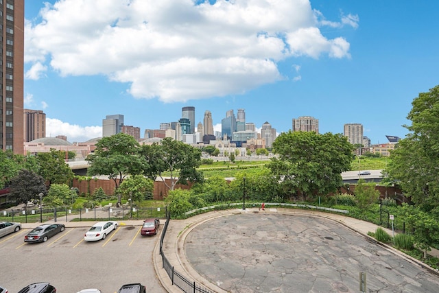 1718 Clinton Ave Unit 6, Minneapolis, MN 55404 - surrounding community featuring a view of skyline and uncovered parking