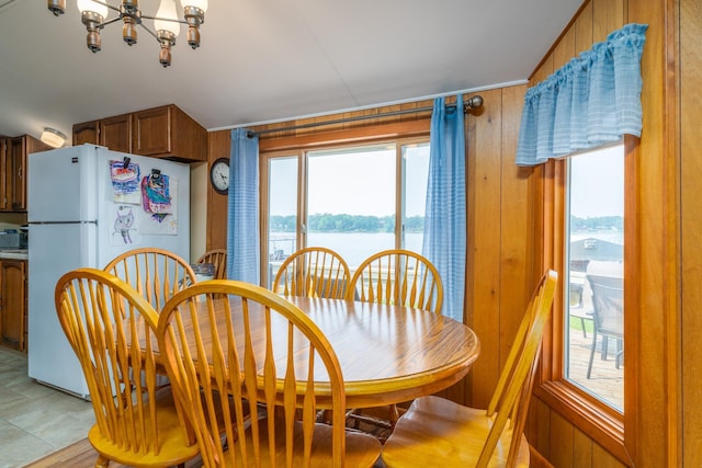 13506 Elmer Hanson Dr SE, Woodside Twp, MN 56736 - dining space with a chandelier, plenty of natural light, and a water view