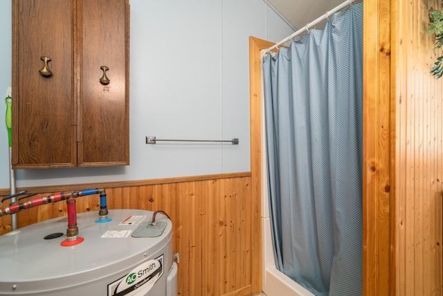 13506 Elmer Hanson Dr SE, Woodside Twp, MN 56736 - full bathroom with water heater, a wainscoted wall, a shower with curtain, and wood walls