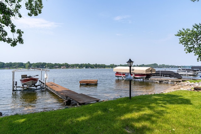 13506 Elmer Hanson Dr SE, Woodside Twp, MN 56736 - dock with boat lift and a water view