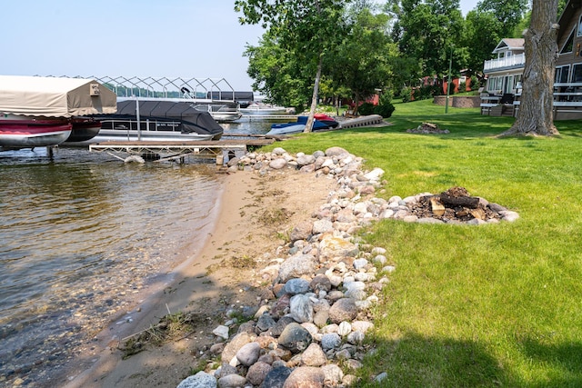 13506 Elmer Hanson Dr SE, Woodside Twp, MN 56736 - dock with boat lift, a yard, and a water view