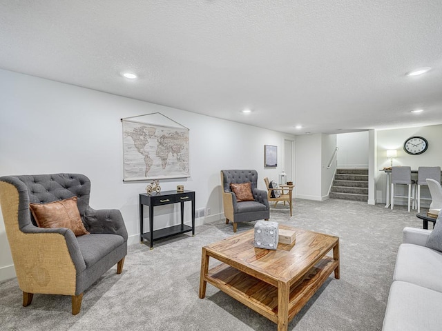 4909 Trillium Ln, Edina, MN 55435 - living area featuring light carpet, stairs, a textured ceiling, and recessed lighting