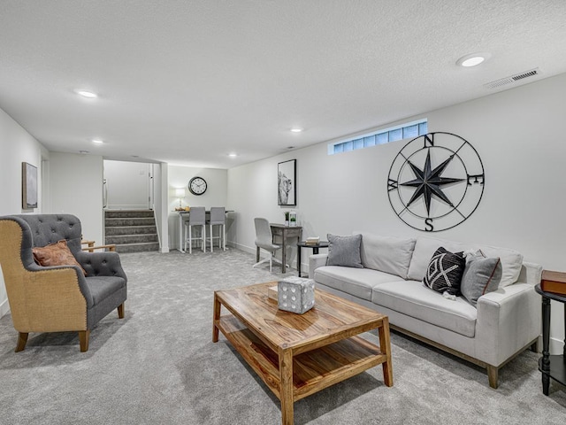 4909 Trillium Ln, Edina, MN 55435 - living area featuring recessed lighting, stairway, light carpet, and a textured ceiling