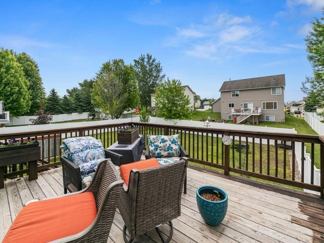 1813 Canton Rd, Prescott, WI 54021 - wooden deck featuring outdoor lounge area and a residential view