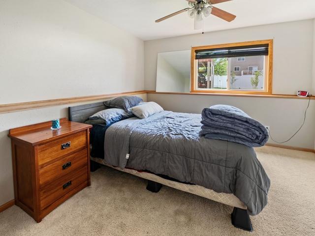 1813 Canton Rd, Prescott, WI 54021 - bedroom featuring light colored carpet and a ceiling fan