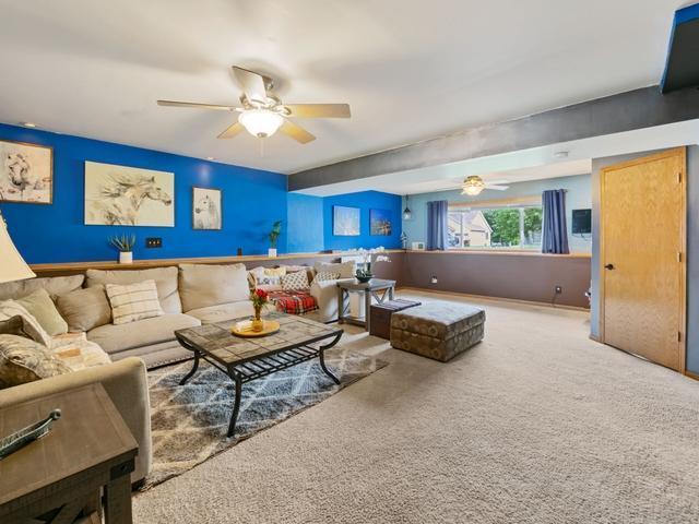 1813 Canton Rd, Prescott, WI 54021 - living area with ceiling fan and carpet floors