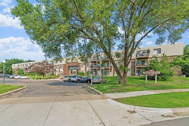 2801 Flag Ave N Unit 314, New Hope, MN 55427 - view of property with uncovered parking and a residential view