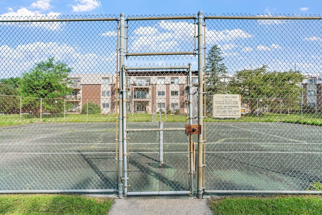 2801 Flag Ave N Unit 314, New Hope, MN 55427 - view of tennis court featuring a gate