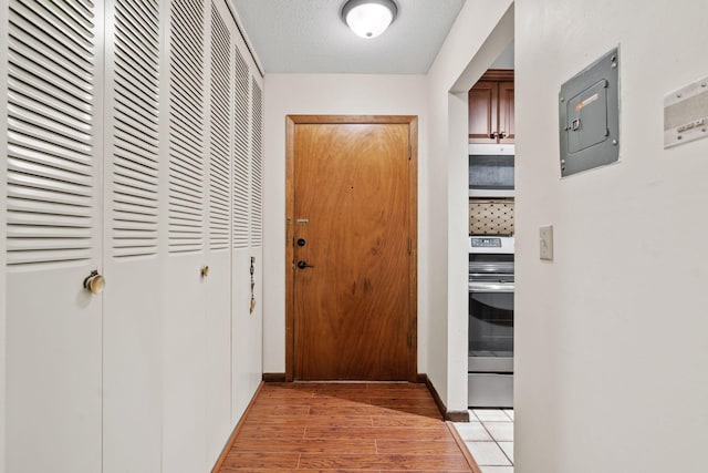 2801 Flag Ave N Unit 314, New Hope, MN 55427 - entryway featuring electric panel and light wood-style flooring