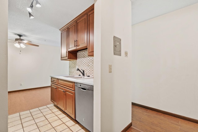 2801 Flag Ave N Unit 314, New Hope, MN 55427 - kitchen with dishwasher, ceiling fan, backsplash, track lighting, and light countertops
