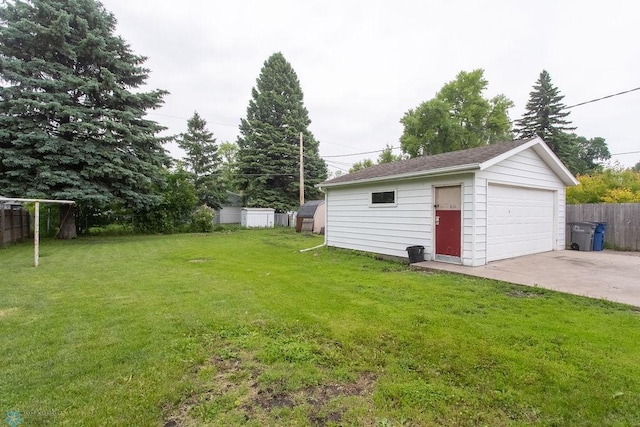 1820 5th St S, Moorhead, MN 56560 - view of yard with an outbuilding and a detached garage