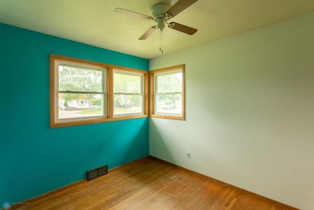 1820 5th St S, Moorhead, MN 56560 - empty room featuring wood finished floors and ceiling fan