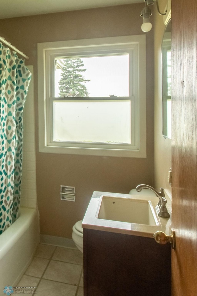 1820 5th St S, Moorhead, MN 56560 - bathroom featuring vanity, tile patterned flooring, and shower / bathtub combination with curtain
