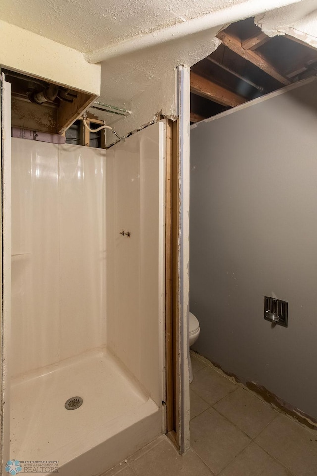 1820 5th St S, Moorhead, MN 56560 - bathroom with a shower stall and tile patterned floors