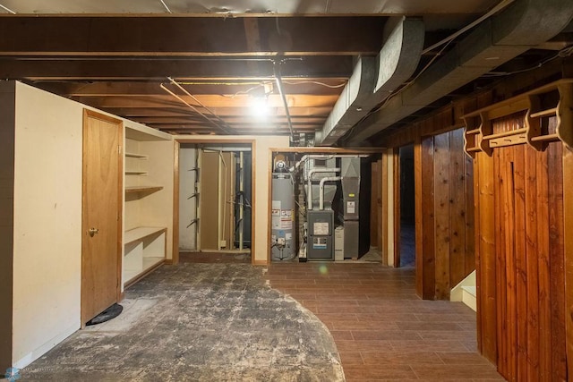 1820 5th St S, Moorhead, MN 56560 - unfinished below grade area featuring water heater and heating unit