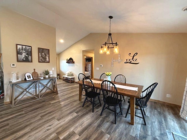 16696 Eclipse Dr, Park Rapids, MN 56470 - dining space with wood finished floors, a chandelier, and lofted ceiling