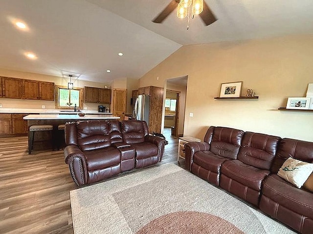 16696 Eclipse Dr, Park Rapids, MN 56470 - living area featuring light wood-style floors, ceiling fan, vaulted ceiling, plenty of natural light, and recessed lighting