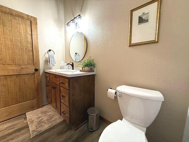 16696 Eclipse Dr, Park Rapids, MN 56470 - bathroom featuring wood finished floors and vanity