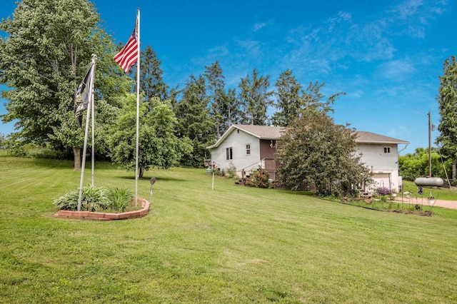 1388 13 1/2 Ave, Barron, WI 54812 - view of green lawn with a garage