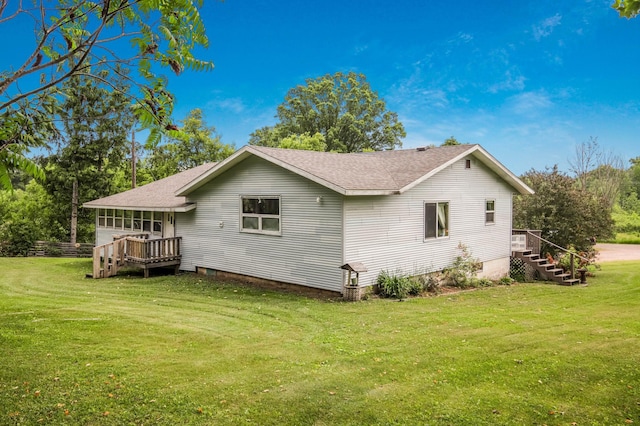 1388 13 1/2 Ave, Barron, WI 54812 - view of side of property with roof with shingles and a yard