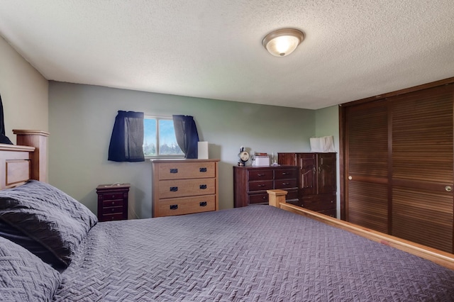 1388 13 1/2 Ave, Barron, WI 54812 - bedroom with a textured ceiling